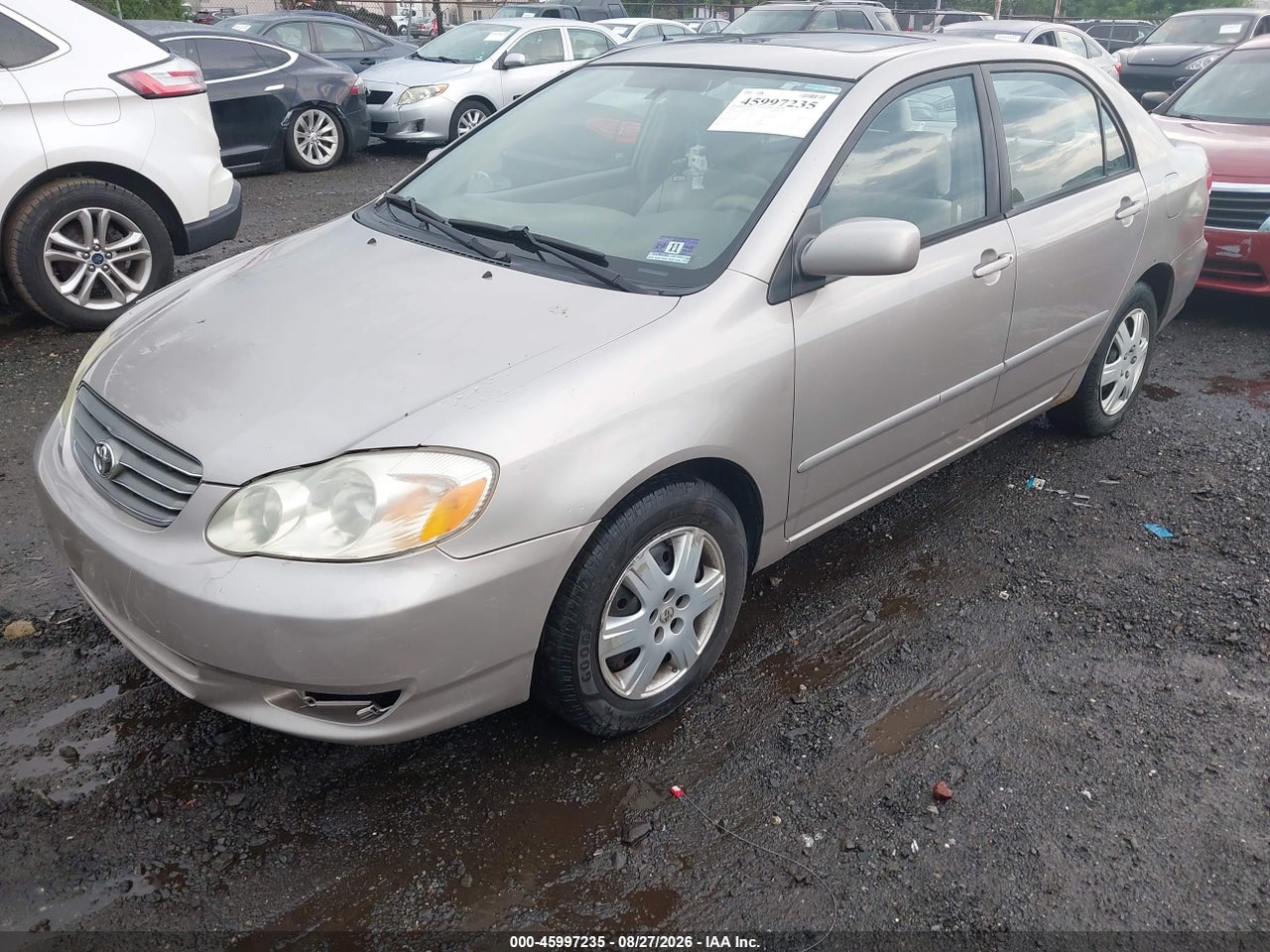 2003 TOYOTA COROLLA LE · 2/11
