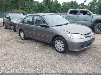 1HGES16594L****** · 2004 HONDA CIVIC LX