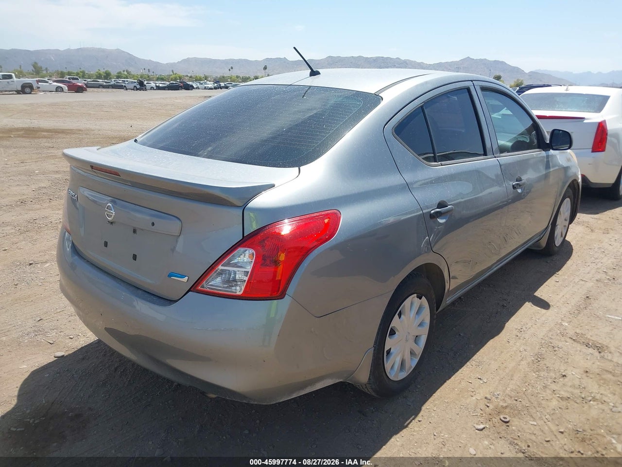 2014 NISSAN VERSA 1.6 S+ · 4/11