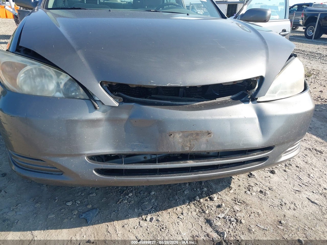 2004 TOYOTA CAMRY LE · 6/11